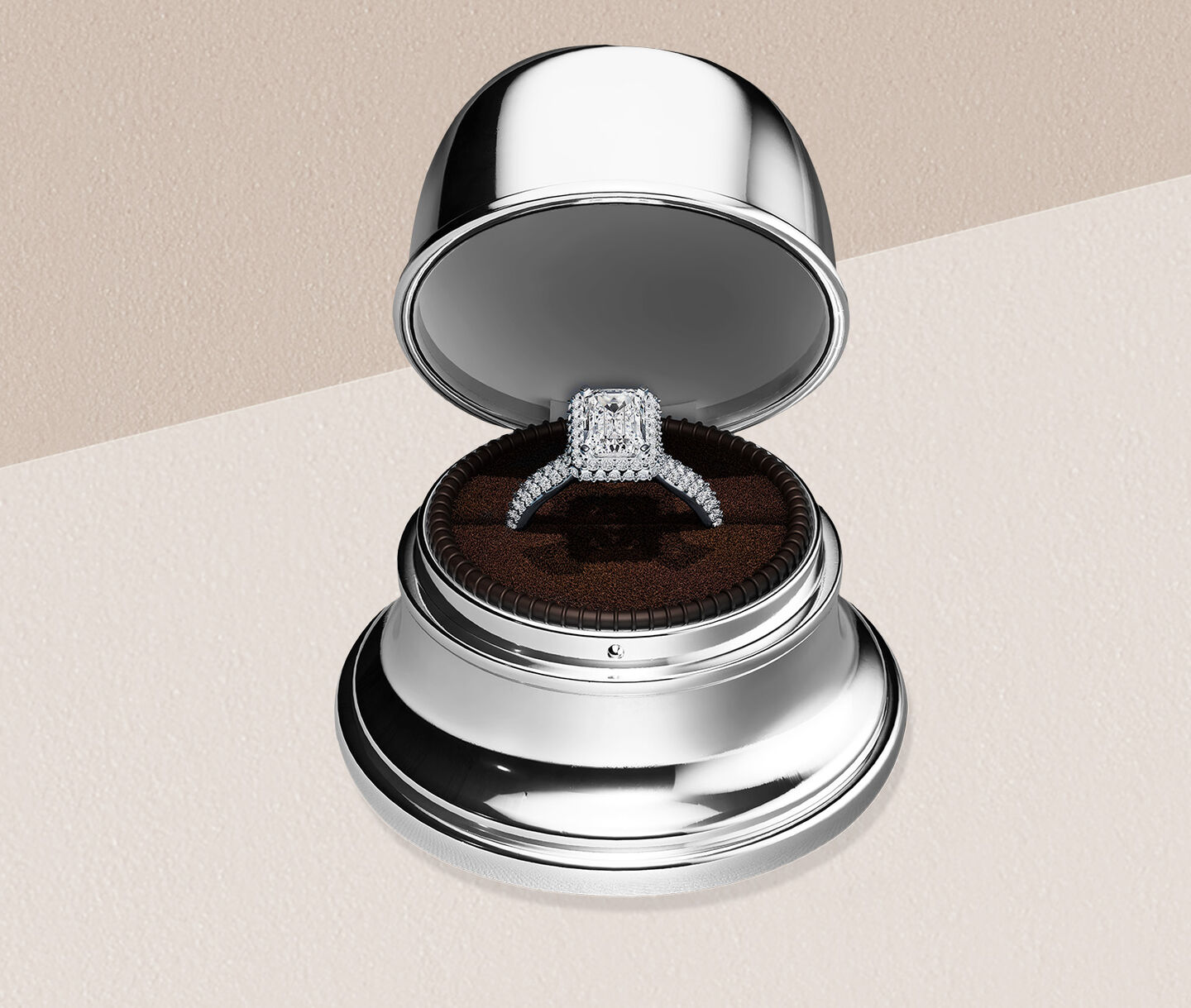 Birks diamond engagement ring on a beige background.